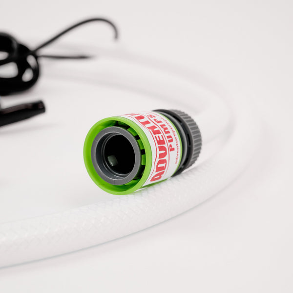 Circular logo with mountains, trees, and a river under a colorful sunset. Text reads ADVENTURE PUMPS above Go Further, Stay Longer! in bold, curved lettering.