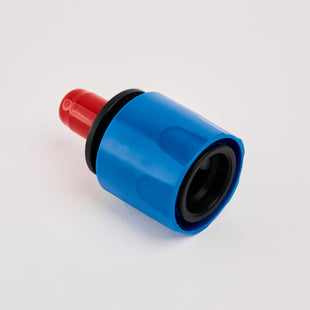 The Wasp Stopper is a small cylindrical plastic component with a blue body, black ring, and red cap, shown on a white background. Ideal for caravan hose connections, this fitting prevents wasps from entering hoses.