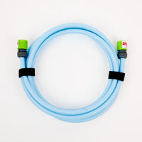 A 1 x 5 meter extension hose inc fittings, coiled with green connectors and two black Velcro straps, sits on a white background—ideal for efficient water transfer and perfect for Adventure Pumps enthusiasts.