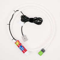 The Adventure Pumps Essentials Pump Kit – Power Accessory Compatible is shown with a white flexible tube (red label), green connector, silver metal part, and black cable with Velcro tie—ideal for off-grid water transfer. All displayed on a white background.