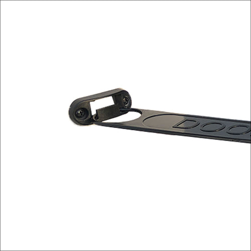 Close-up of the Door Latch Extension – Each: a black plastic bracket with screw holes, screw, and bolt end, attached to a thin panel—ideal for caravan door latch setups—shown against a white background.