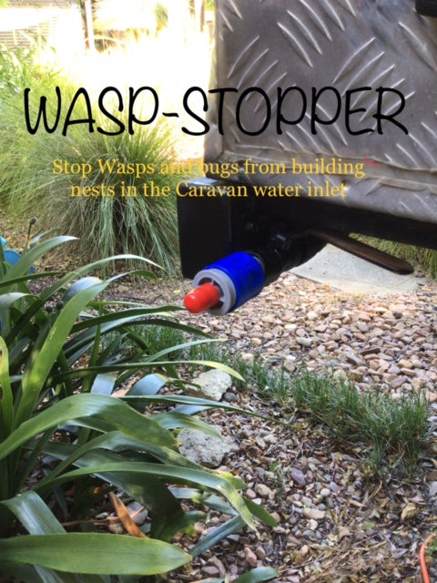 A close-up of a caravan water inlet with a red and blue Wasp Stopper attached, surrounded by plants and gravel. Text reads: Wasp Stopper—prevents wasps and bugs from nesting in caravan hose connections.