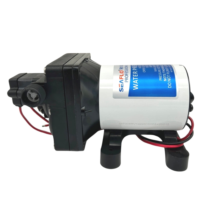 The Seaflo 12V RV Supreme Pump is a compact, quiet water pump featuring a cylindrical white and silver body, a blue label, black mounting base, and red and black wires extending from the left side.