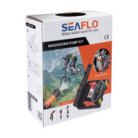 Box of a Seaflo Portable Washdown Kit 12V featuring images of a mountain biker, the pump in action, and kit contents. The packaging highlights "Make water work for you" and displays accessories ideal for cleaning outdoor equipment.